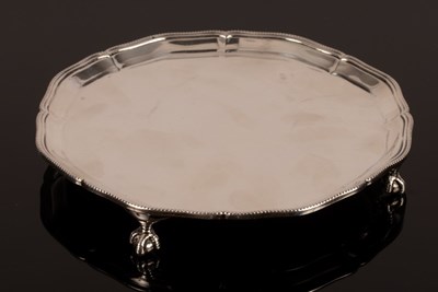 Lot 124 - A silver salver, retailed by Harrods, London...