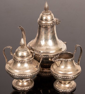 Lot 154 - An Egyptian silver four-piece tea and coffee...