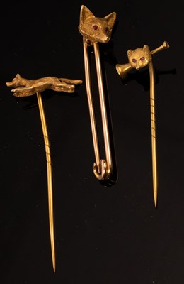 Lot 206 - Three stick pins of hunting interest, one with...