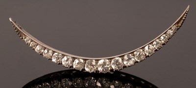 Lot 211 - A Victorian crescent brooch, of seventeen...