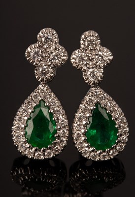 Lot 232 - A pair of emerald and diamond cluster earrings,...