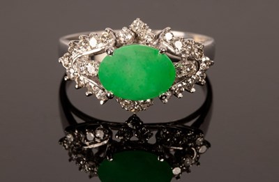 Lot 249 - A jade and diamond dress ring, set in 18k...