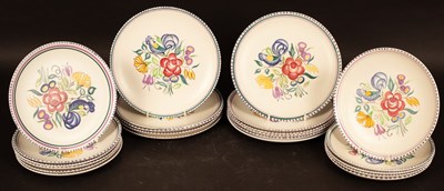 Lot 306 - Poole Pottery, thirteen floral decorated...