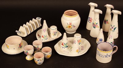 Lot 310 - Poole Pottery, two condiment sets with trays,...