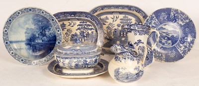 Lot 320 - A quantity of blue and white willow pattern...