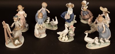 Lot 324 - Nine Lladro figures to include an artist and...