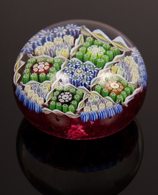 Lot 366 - A Perthshire glass paperweight of millefiori...