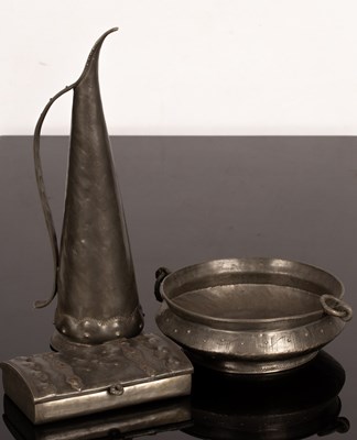 Lot 373 - A pewter oil jug of slender tapering form with...