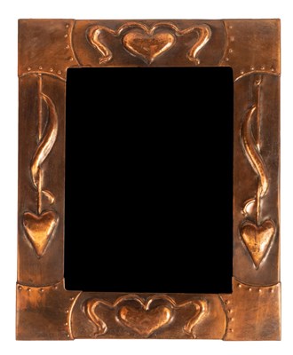 Lot 376 - An Arts & Crafts style copper mirror, the...