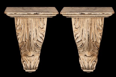 Lot 410 - A pair of cream painted plaster brackets with...