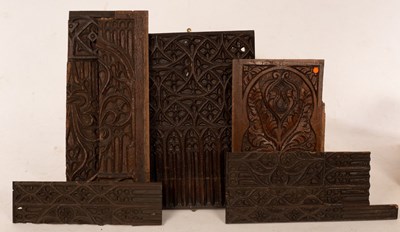 Lot 423 - A quantity of carved fragments of panelling,...