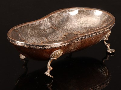 Lot 430 - An oblong nut dish on scroll feet, 30cm x 15cm