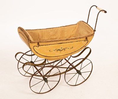 Lot 450 - A child's Victorian doll's pram with porcelain...