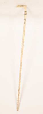 Lot 477 - A whalebone and tooth walking cane, the handle...