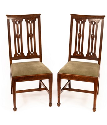 Lot 510 - A pair of Arts & Crafts oak dining chairs by...