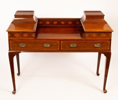 Lot 522 - An Edwardian mahogany table with drawers to...