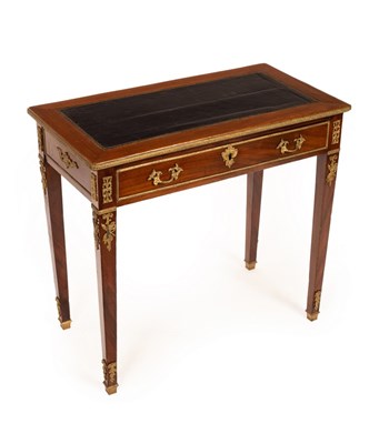 Lot 526 - A Louis XVI style French writing table with...