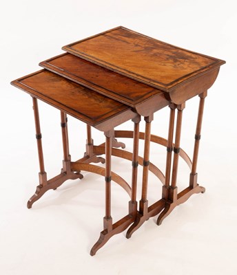 Lot 538 - A nest of three mahogany tables, the largest...