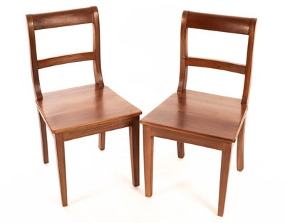 Lot 545 - A pair of mahogany chairs with solid seats, on...