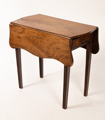 Lot 547 - A George III mahogany two-flap Pembroke table,...