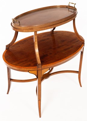 Lot 561 - An Edwardian mahogany two-tier tray table...