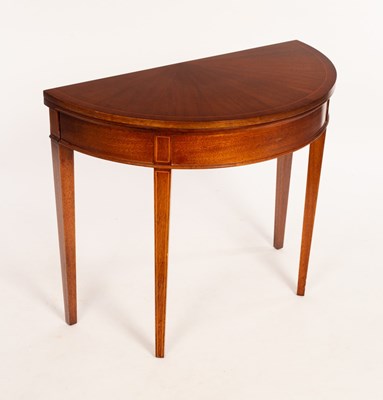 Lot 563 - A mahogany D-shaped card table, lined green...