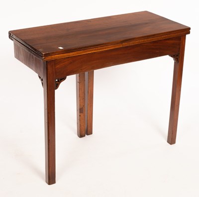 Lot 571 - A George III mahogany card table on square...