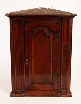 Lot 603 - A mahogany corner cupboard, 77cm wide