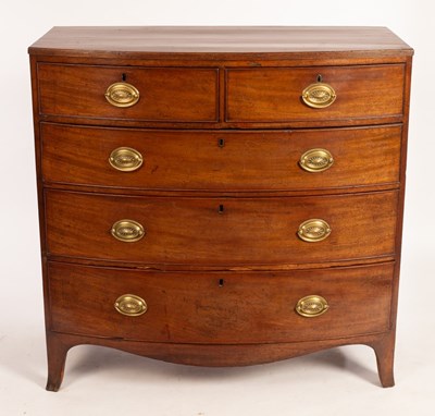 Lot 604 - An early 19th Century mahogany bowfront chest...