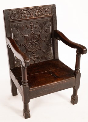 Lot 605 - A child's oak chair, the back with 17th...