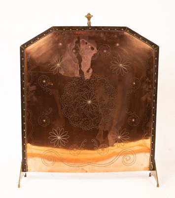 Lot 610 - An Arts & Crafts copper fire screen, engraved...