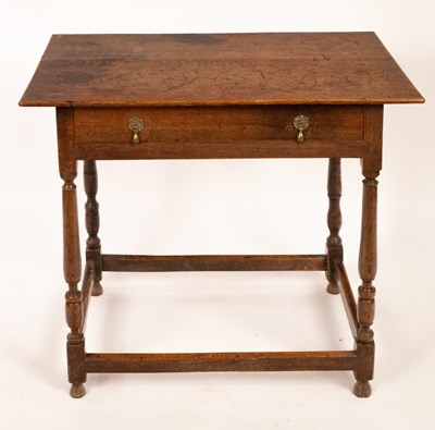 Lot 614 - An 18th Century oak side table, fitted a...