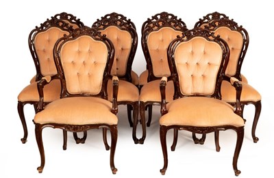 Lot 619 - A set of ten dining chairs with scrolling...