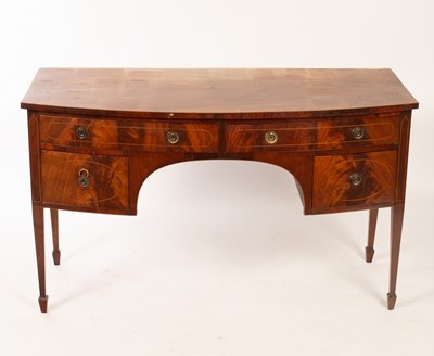 Lot 651 - A mahogany bowfront sideboard on square...