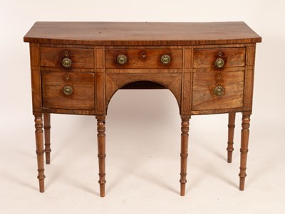 Lot 661 - A George IV mahogany bowfront kneehole...