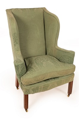 Lot 663 - An 18th Century upholstered wing back armchair,...