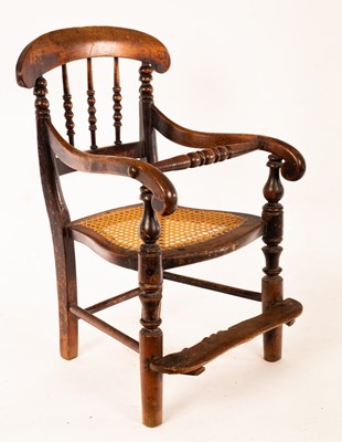 Lot 676 - A child's Victorian chair with foot support...