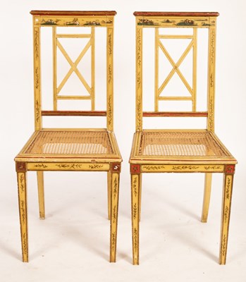 Lot 692 - A pair of Japanned cane chairs, 96cm high