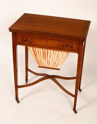 Lot 710 - A late 19th Century satinwood work/card table,...