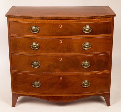 Lot 714 - An early 19th Century mahogany bowfront chest...