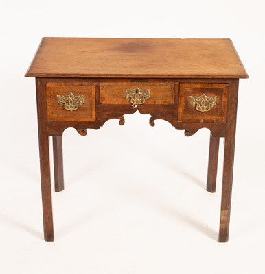 Lot 719 - An oak and crossbanded lowboy on square...