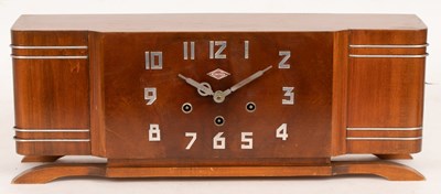 Lot 732 - A 1930's IROD mantel clock in a walnut case...