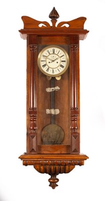 Lot 736 - A Vienna eight-day regulator wall clock in a...