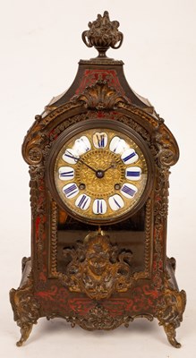 Lot 742 - A 19th Century French mantel clock of Rococo...