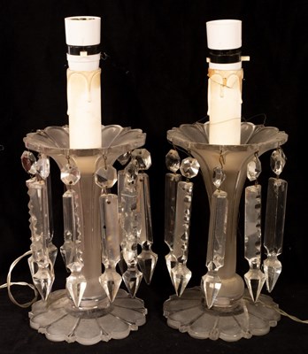 Lot 755 - A pair of clear glass lustres hung elongated...