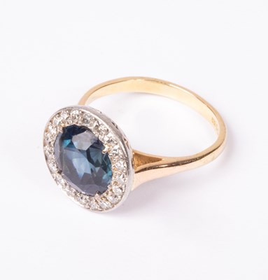 Lot 109 - An 18ct yellow gold Art Deco style sapphire and diamond circular cluster ring