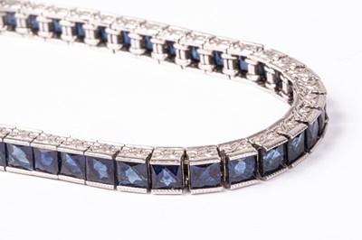 Lot 46 - A platinum and sapphire line bracelet