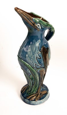 Lot 110 - Brannam Barum ware, pottery stork vase of blue,...