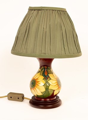 Lot 123 - Moorcroft pottery, Inca Sunflower lamp, design...