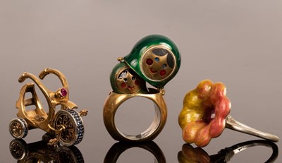 Lot 335 - Three silver and enamel novelty rings, in the...